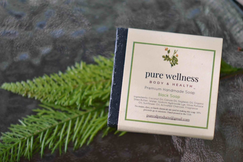 Pure wellness black charcoal and tea tree essential oil soap for acne