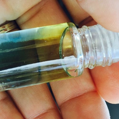 Pure wellness essential oils, roller bottle, medicinal health and wellness